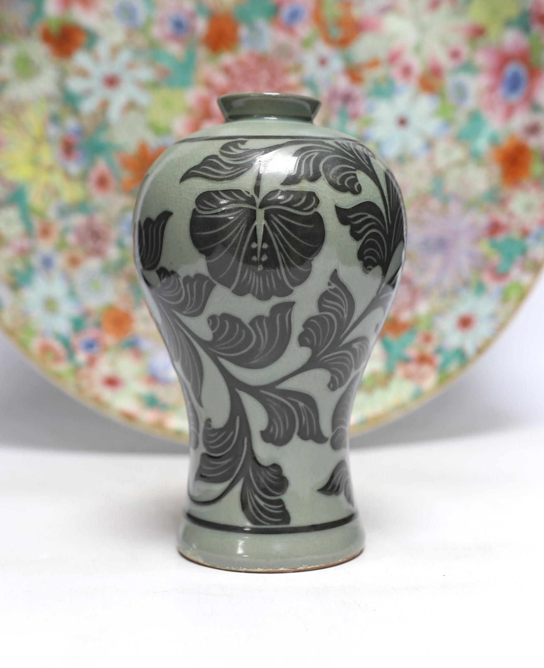 A Chinese millefleur enamelled porcelain dish, six character Qianlong seal mark, but late 19th/early 20th century, 38cm diameter and a Korean celadon vase